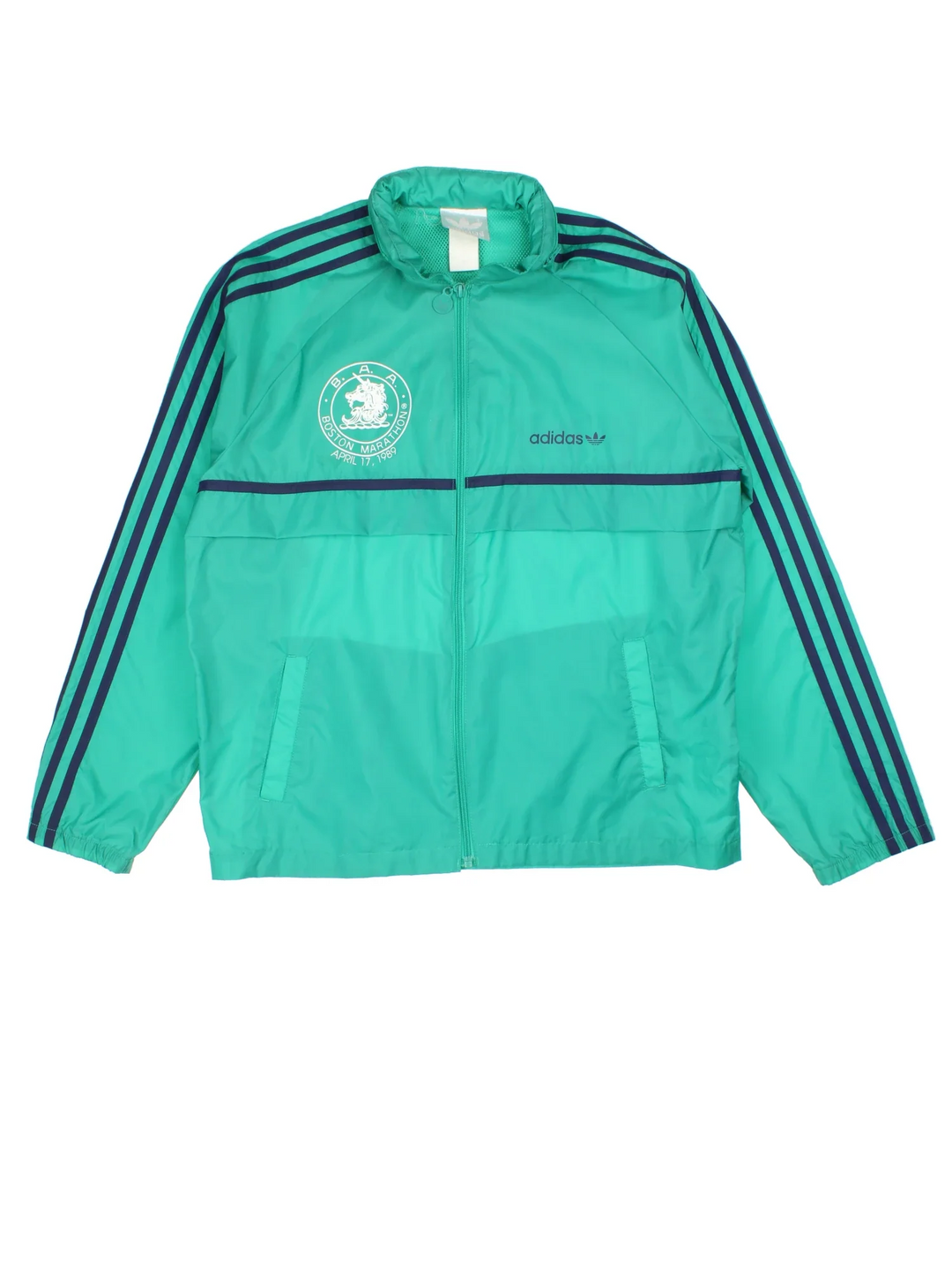 1989 Adidas Boston Marathon Running Jacket in a green colourway. Zips up and has side pockets, and has the logos printed on the front and spell out on the back.