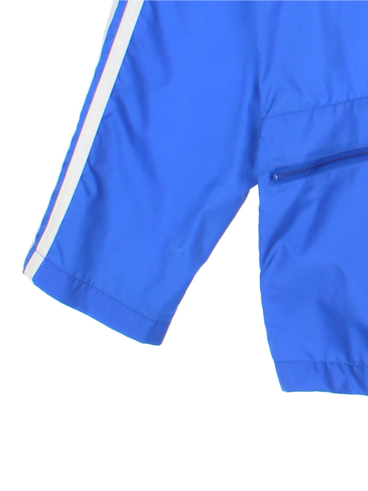 70's Adidas Windbreaker Jacket in a blue colourway. Zips up and has side pockets, and has the logo embroidered on the front.