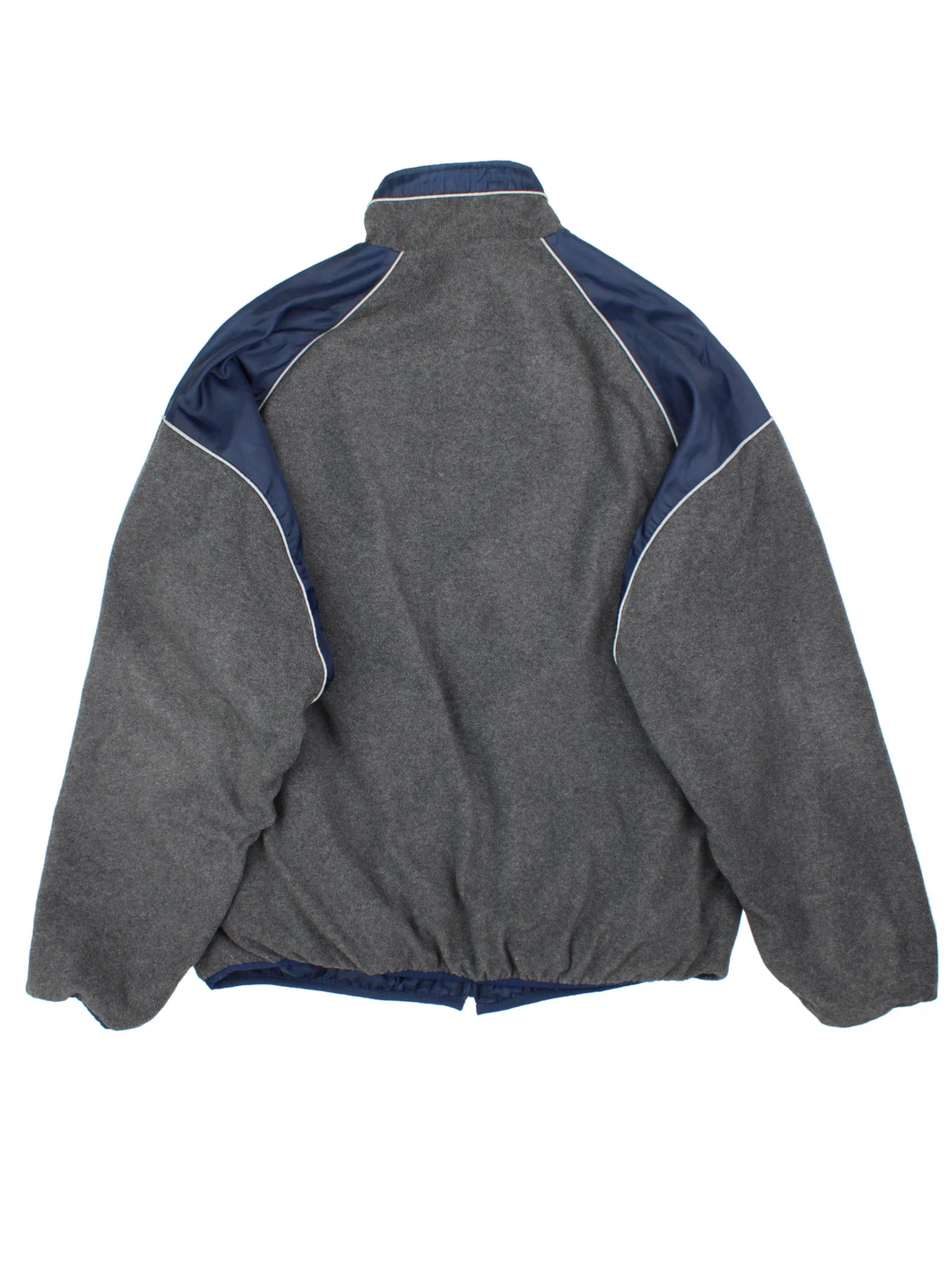 New England Patriots NFL Reversible Jacket in either a blue jacket colourway or grey fleece option. Zips up and has side pockets, and has the team logo embroidered on the front and back.