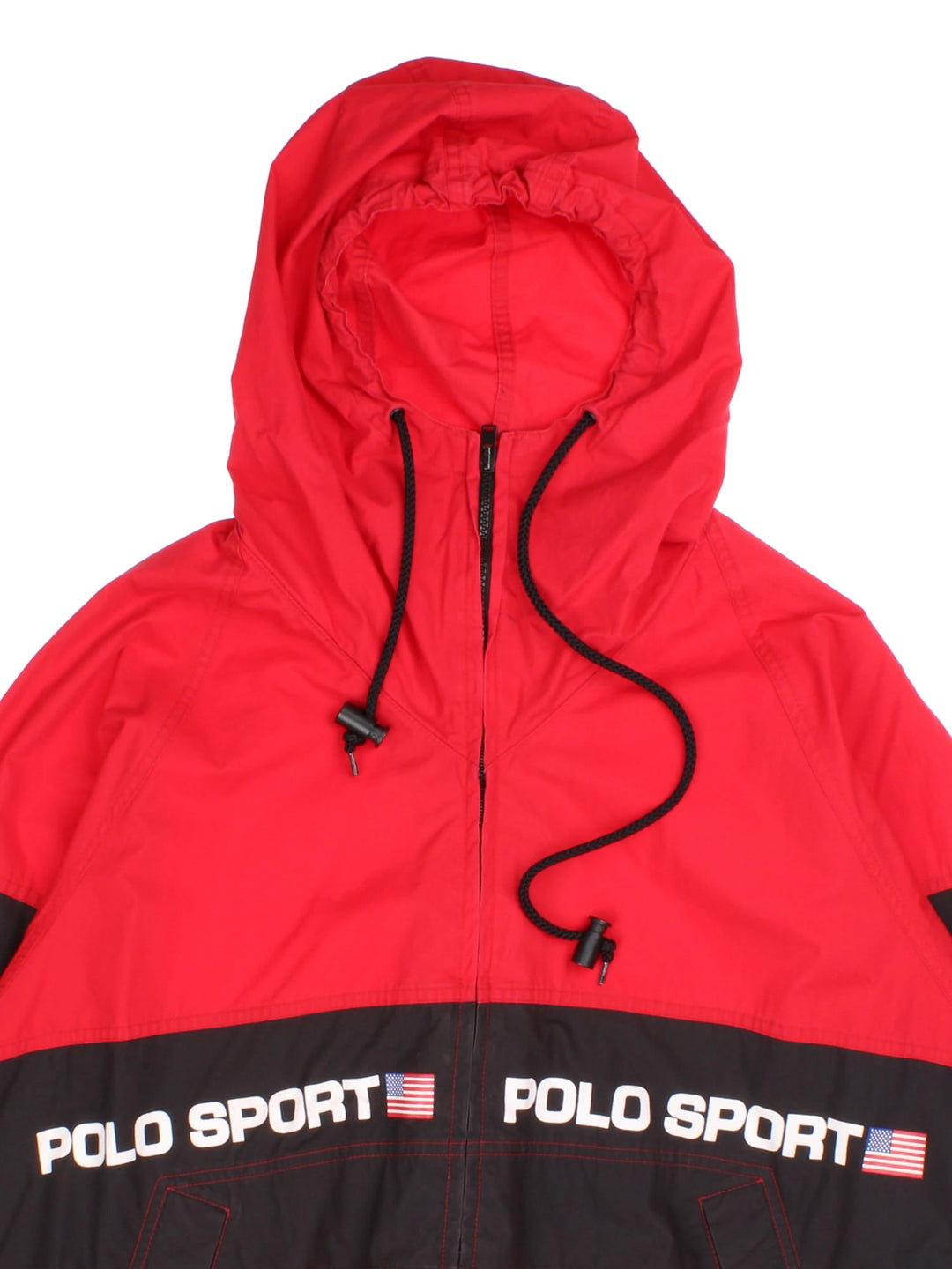 Ralph Lauren Polo Sport Jacket in a red colourway with black panelling. Full zip with drawstring hood and button pockets on the front. Polo Sport logo wrapped around.