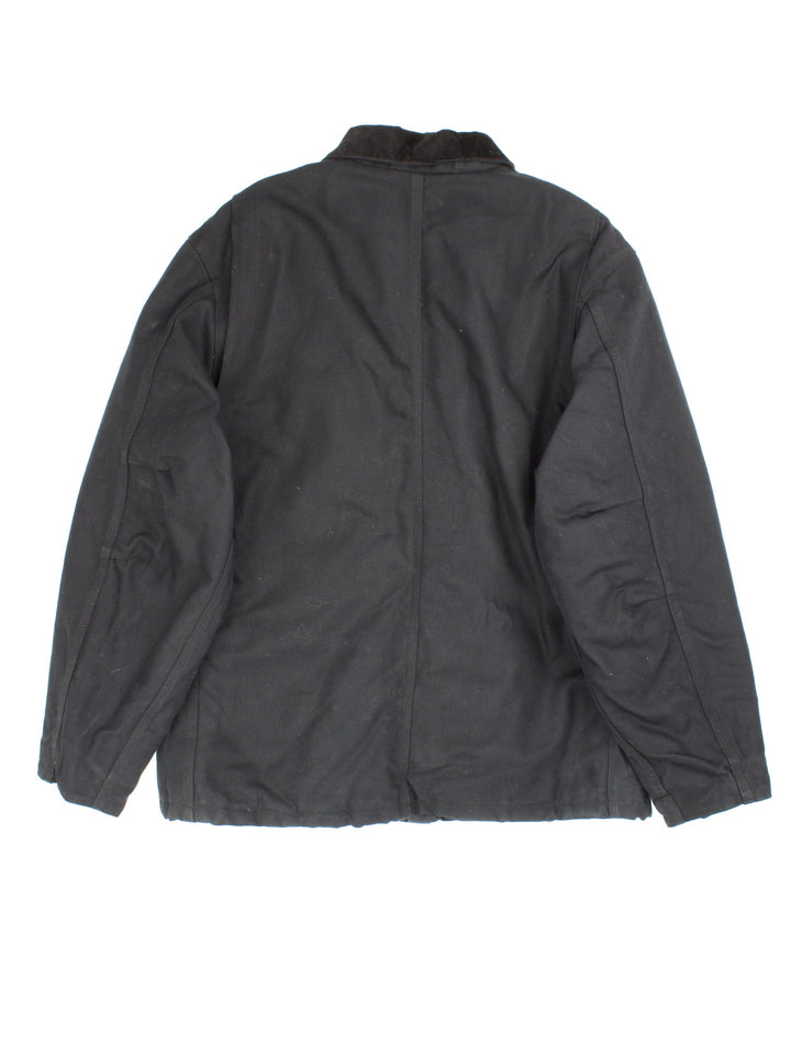 Carhartt Arctic Jacket in a black colourway. Zips up and has multiple pockets, insulated with a quilted lining, and has the logos embroidered on the front.