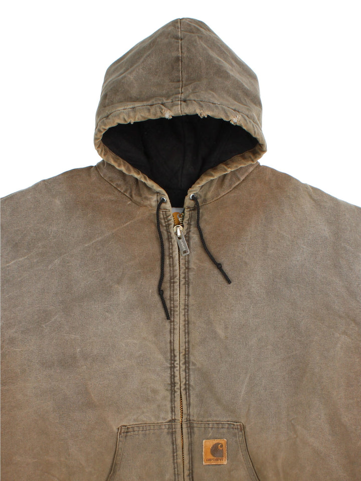Carhartt Active Jacket in a brown colourway. Zips up and has side pockets, hooded, and has the logo embroidered on the front.