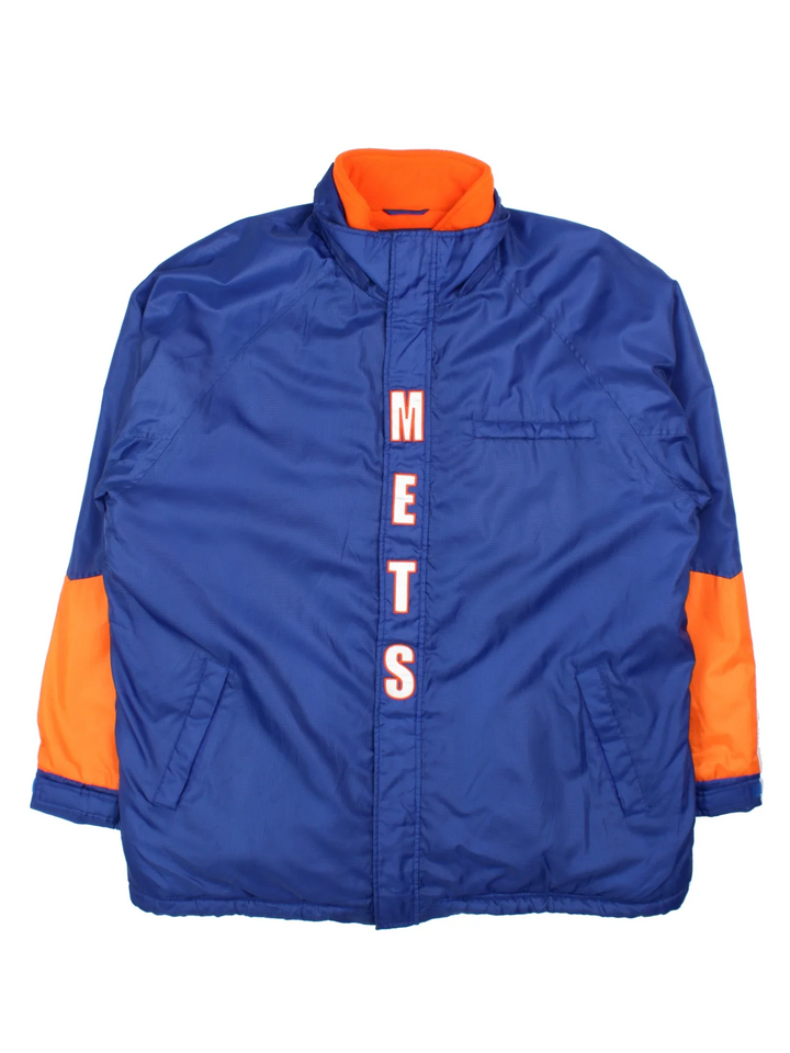 New York Mets MLB Jacket in a blue colourway with orange detailing. Full zip up, team logo on the front and larger text logo across the back.