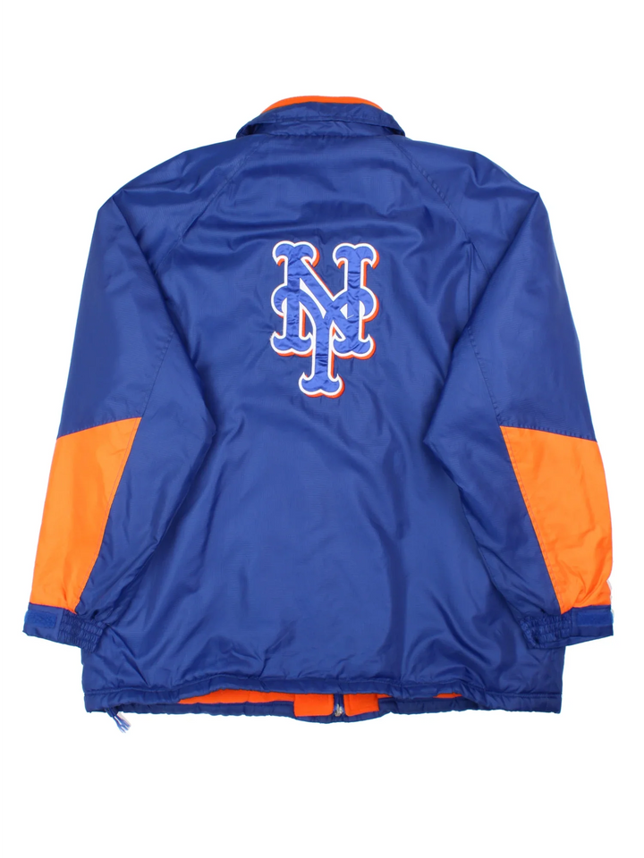 New York Mets MLB Jacket in a blue colourway with orange detailing. Full zip up, team logo on the front and larger text logo across the back.
