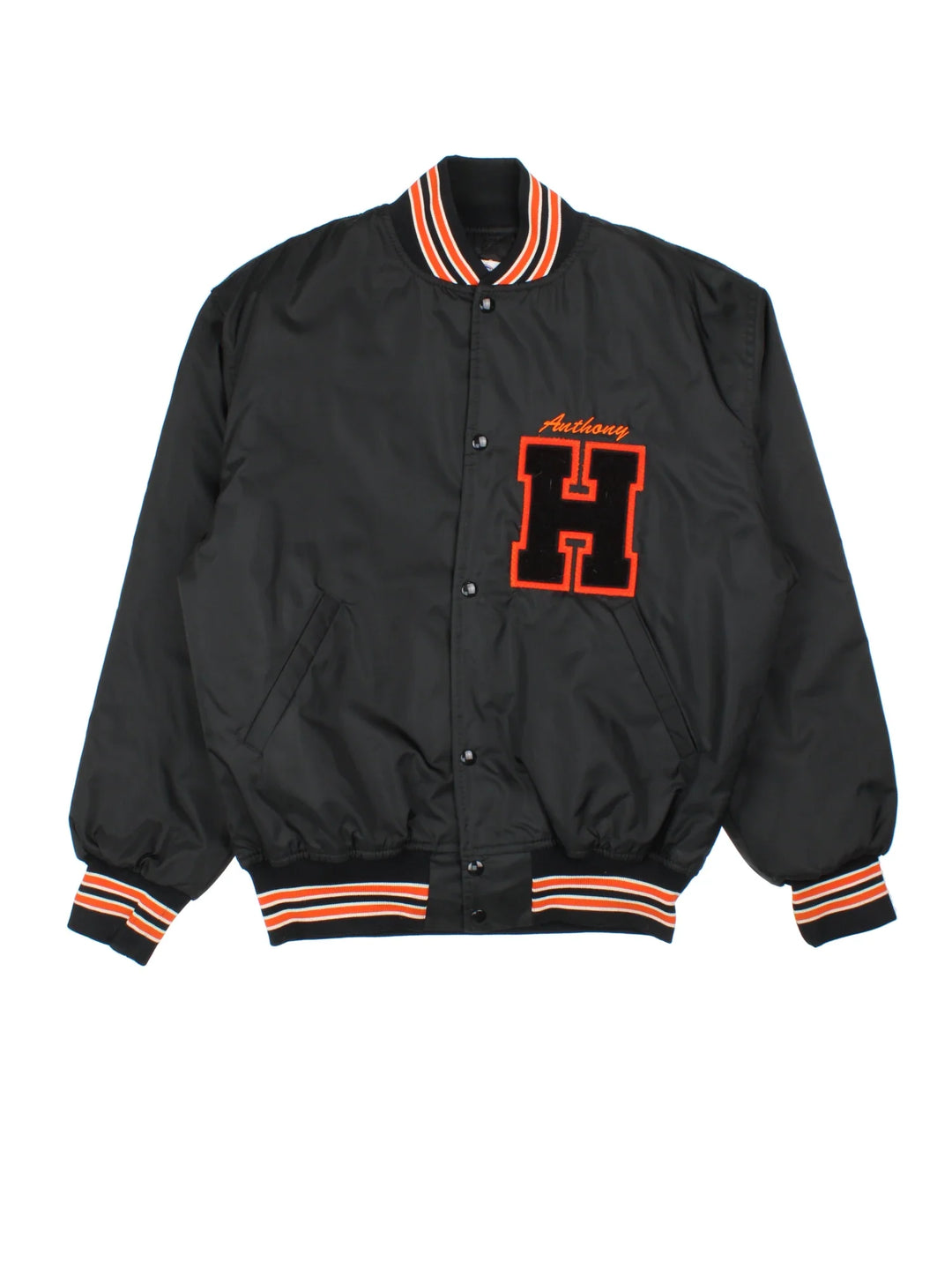 Vintage Harlem Bowling Team Varsity Jacket in a black colourway with orange detailing. Full button up front, multiple pockets and small logo on the front. Large team logo across the back.