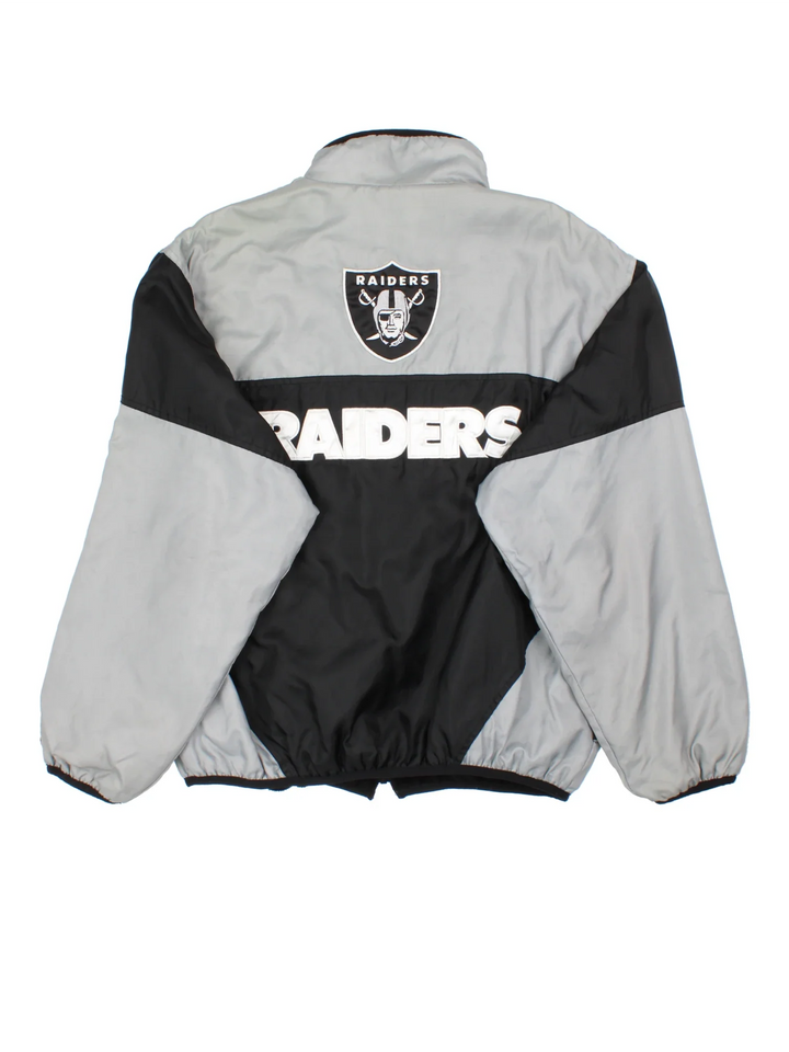 Vintage Oakland Raiders NFL Jacket in a black colourway with grey panelling. Full zip up, small logo on the front and large text logo across the back.