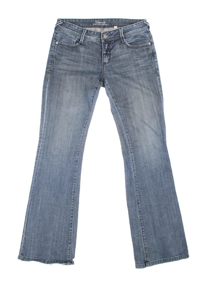 Y2K Diamante Flared Jeans in blue colourway with multiple pockets and diamante detailing on the back.