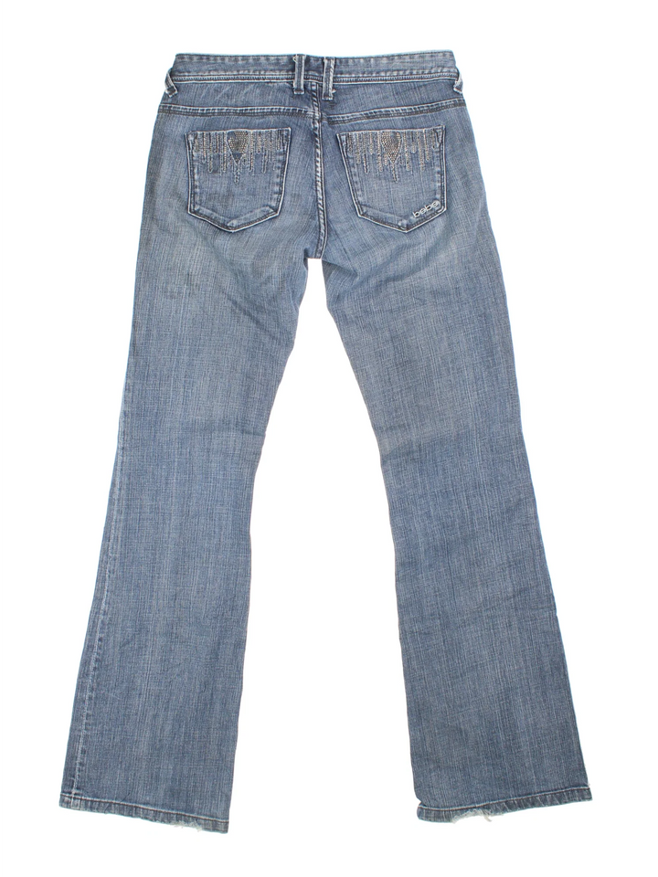 Y2K Diamante Flared Jeans in blue colourway with multiple pockets and diamante detailing on the back.