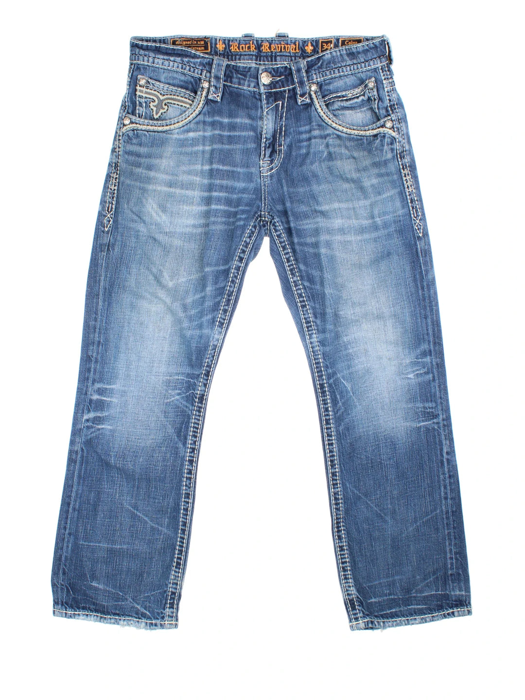 Y2K Rock Revival Jeans in blue colourway with multiple pockets, contrast stitching and embroidered branding on the back.
