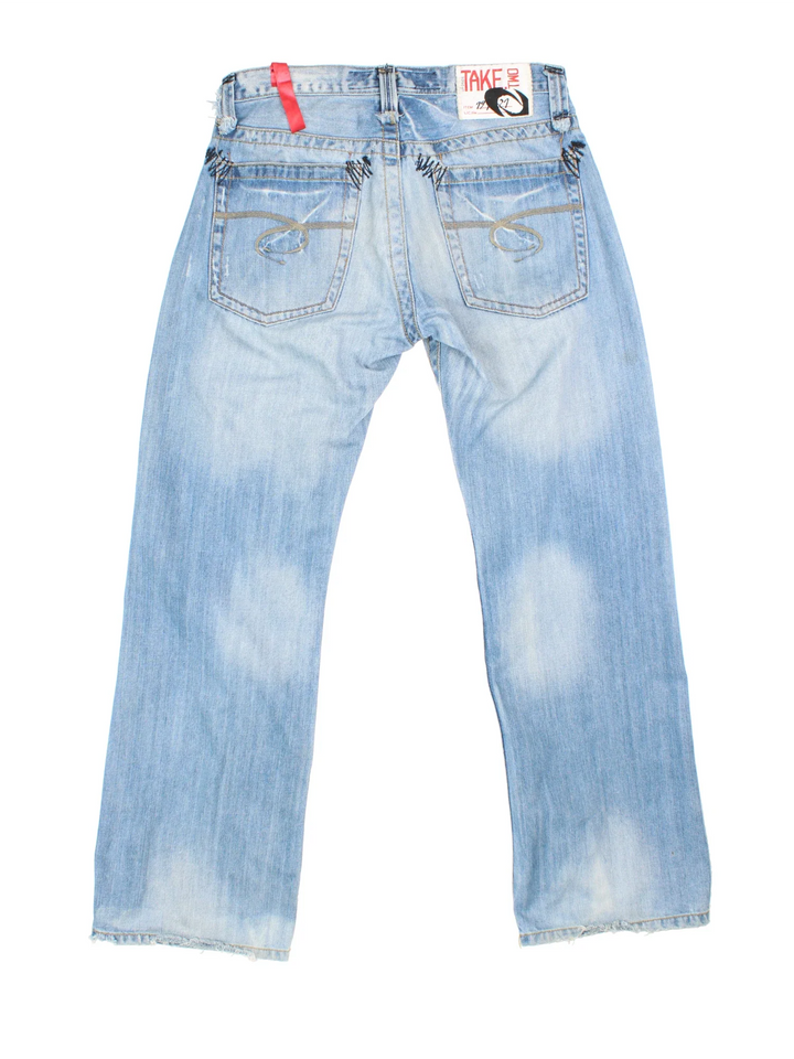 Y2K Take Two Jeans in blue colourway with multiple pockets, contrast stitching and embroidered branding on the back.