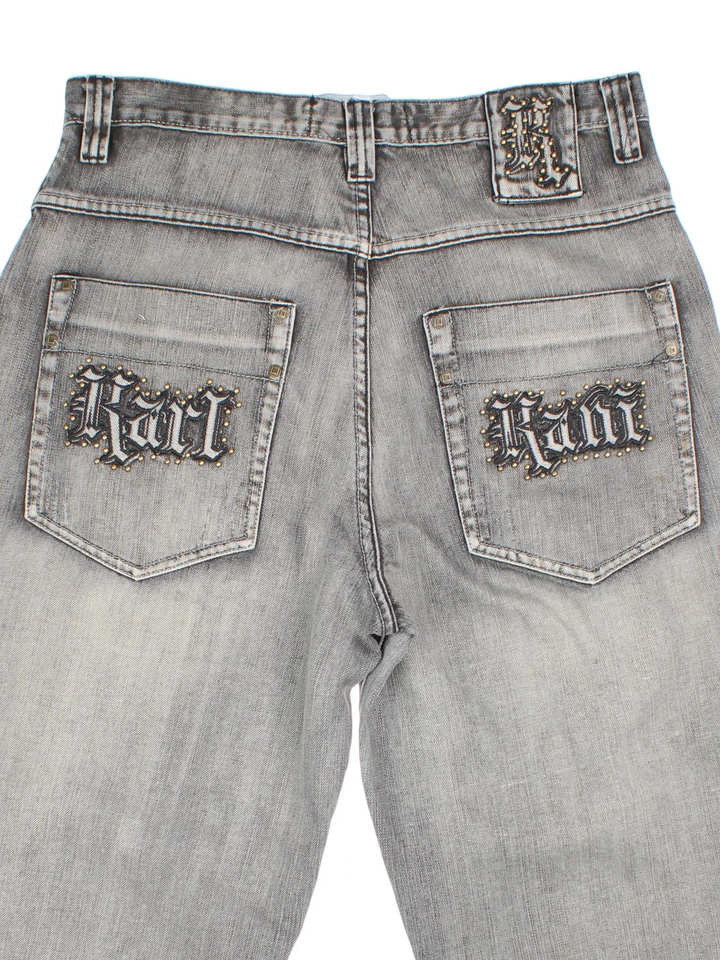 Vintage 90's Karl Kani Jeans in grey colourway with multiple pockets, contrast stitching and studded/embroidered branding on the front/back.