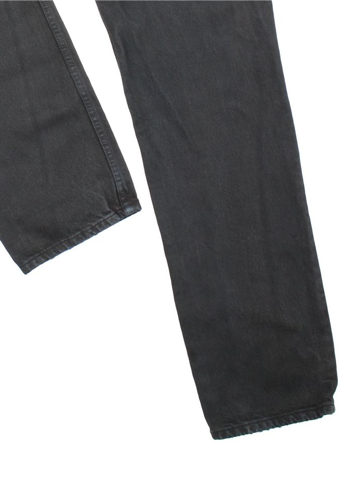 Levi Strauss jeans in black colourway with multiple pockets and logo tab embroidered on the back.