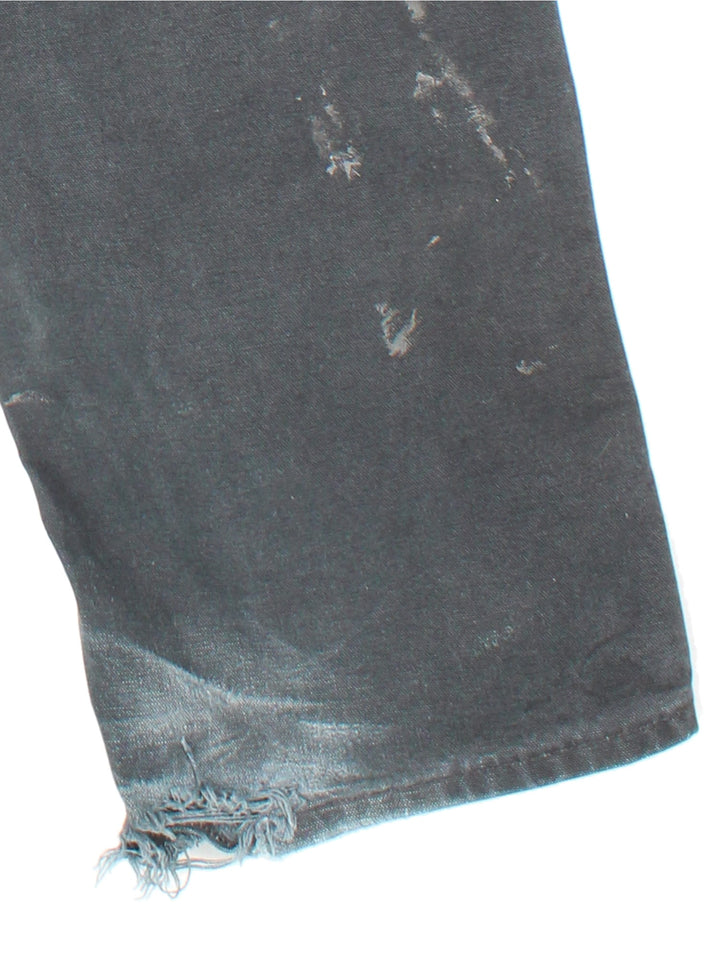Carhartt Double Knee jeans in black colourway with multiple pockets and embroidered logo on back.