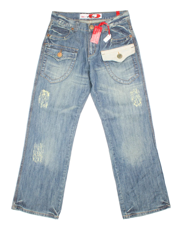 Y2K Take Two Flared Jeans in blue colourway. Multiple pockets, leather detail and embroidered branding on back.