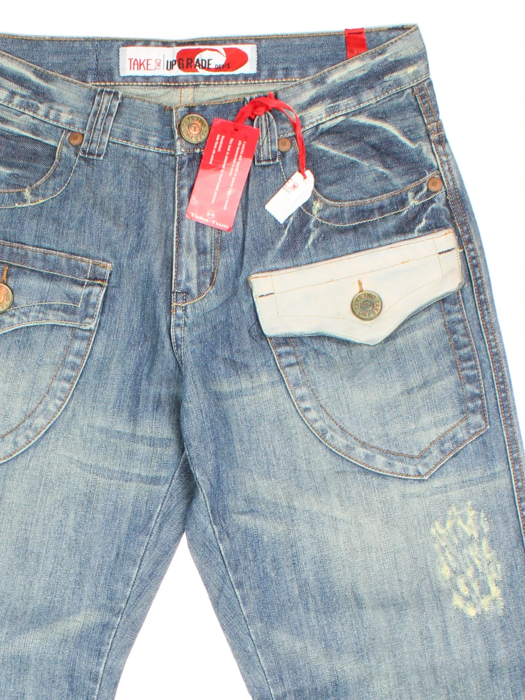 Y2K Take Two Flared Jeans in blue colourway. Multiple pockets, leather detail and embroidered branding on back.