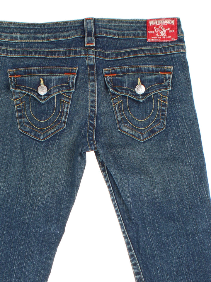 True Religion Y2K Jeans in blue colourway with multiple pockets, rip features and the logo embroidered on the back pockets.