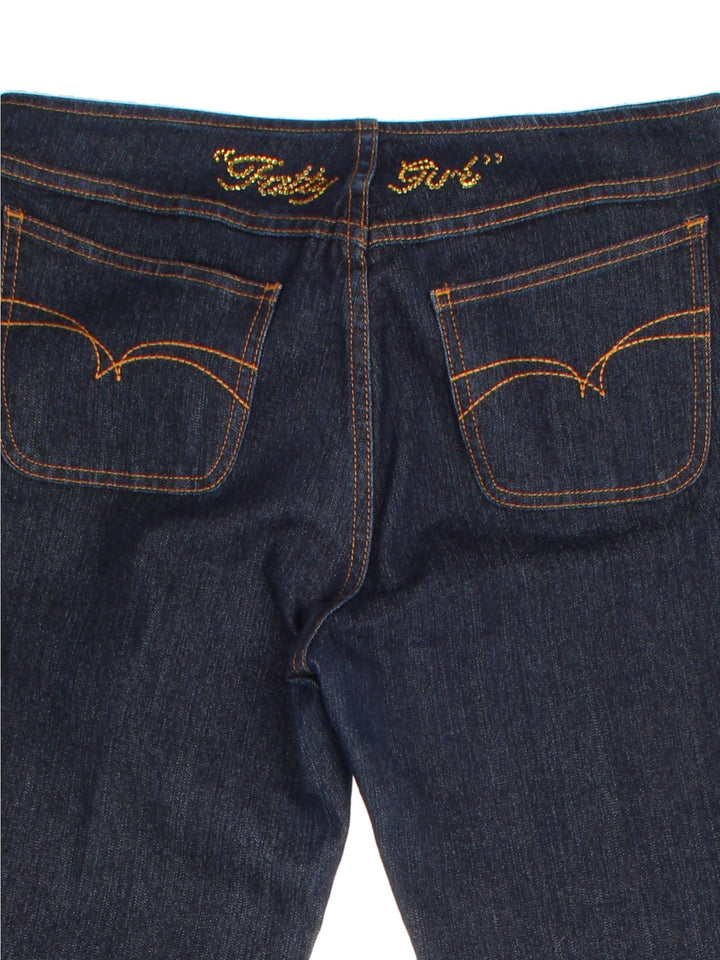 Y2K FUBU Jeans in a dark blue colourway, pin stripe feature, with multiple pockets and the logo embroidered on the back.
