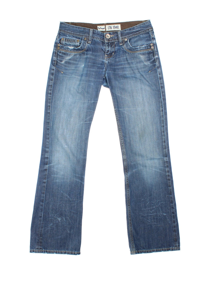 Y2K Low Rise Jeans in blue colourway, with multiple pockets, contrast stitching and embroidered branding on the back.