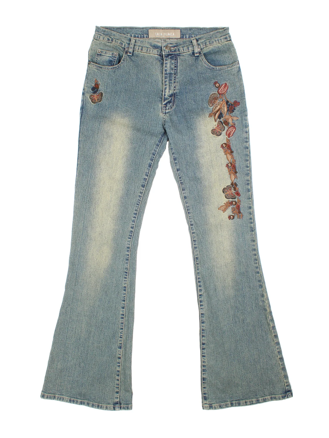 Y2K Embroidered Low Rise Flared Jeans in blue colourway with multiple pockets and embroidered detailing on the front/back.