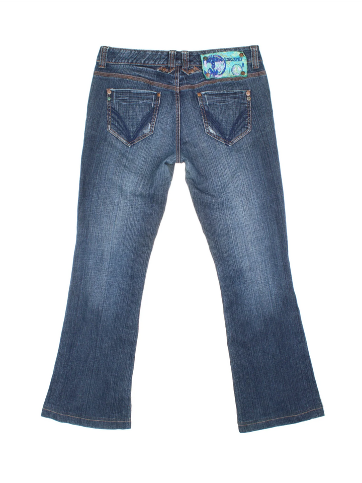 Y2K Low Rise Flared Jeans in blue colourway with multiple pockets and embroidered patch back.