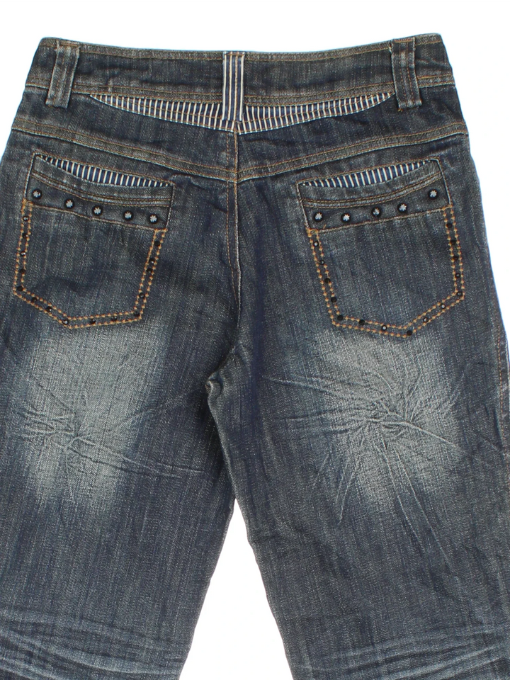 Y2K Studded  Low Rise Flared Jeans in blue colourway with multiple pockets, contrast stitching and stud detail on front and back.