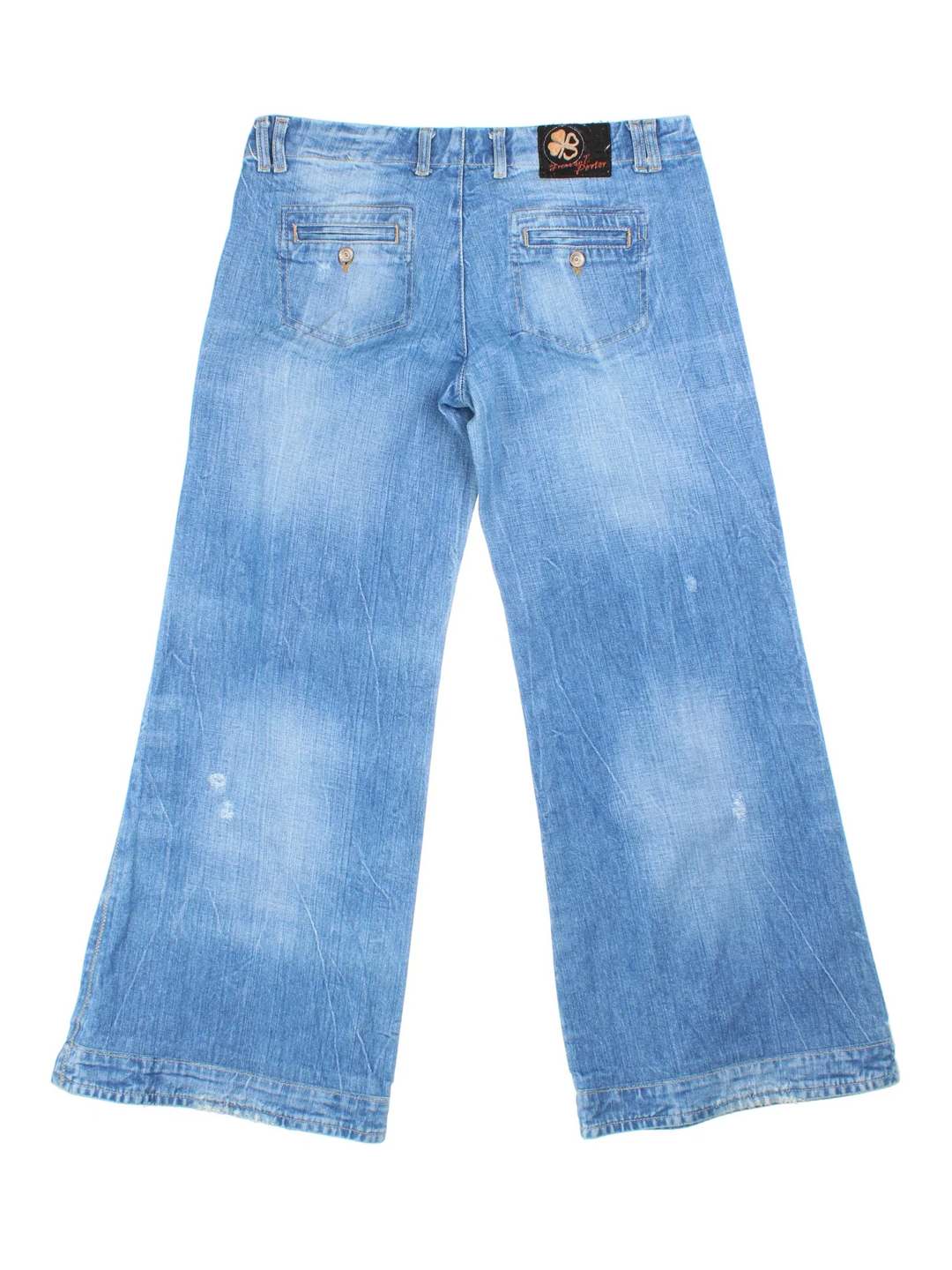 Y2K Low Rise Jeans in blue colourway with multiple pockets, contrast stitching and branding embroidered on the back.