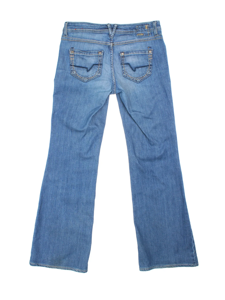 Y2K Low Rise Flared Jeans in blue colourway with multiple pockets, contrast stitching and embroidered logo on the back.