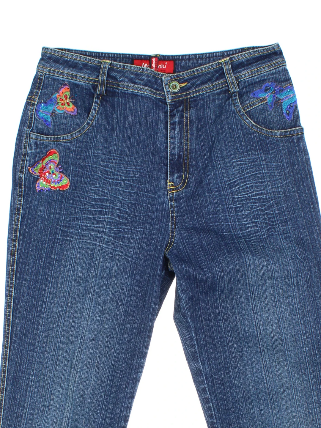 Y2K Diamante Butterfly Flared Jeans in blue colourway with multiple pockets, contrast stitching and diamante detailing on front/back.
