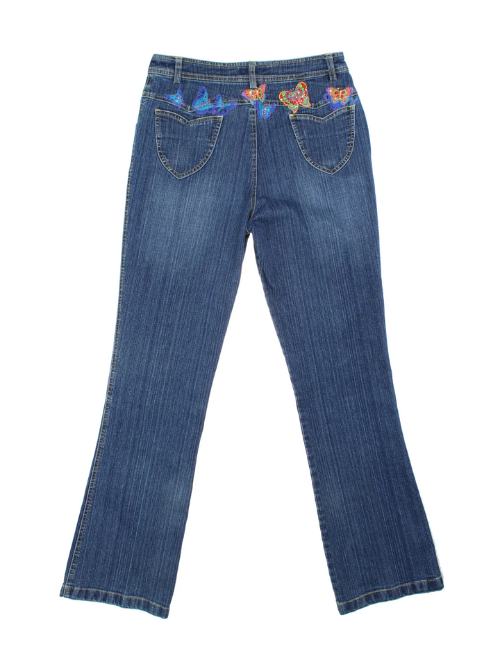 Y2K Diamante Butterfly Flared Jeans in blue colourway with multiple pockets, contrast stitching and diamante detailing on front/back.