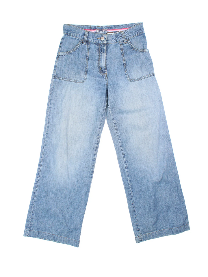 Y2K Wide Leg Jeans in blue colourway with multiple pockets, contrast stitching and leather patch detailing on back.