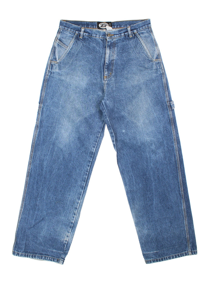 Vintage 90's 2Pac Baggy Jeans in blue colourway with multiple pockets, contrast stitching and embroidered branding on back.