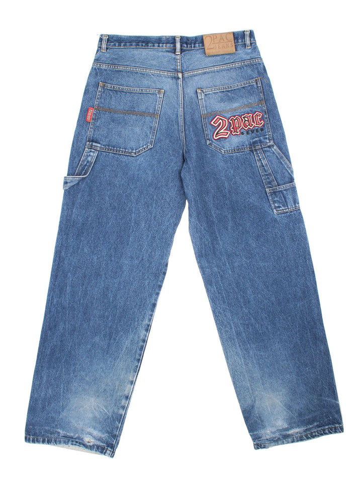 Vintage 90's 2Pac Baggy Jeans in blue colourway with multiple pockets, contrast stitching and embroidered branding on back.