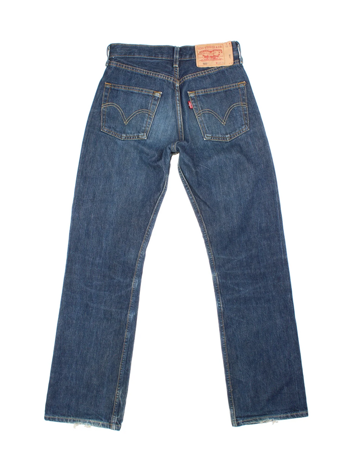 Vintage Levi Strauss 501 Jeans in blue colourway with multiple pockets and the logo embroidered on the back.