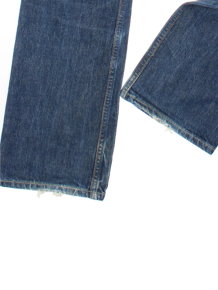Vintage Levi Strauss 501 Jeans in blue colourway with multiple pockets and the logo embroidered on the back.