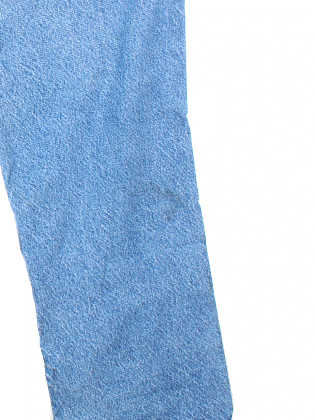 Carhartt Jeans in blue colourway with multiple pockets, plaid pattern lining, and the logo embroidered on the back.