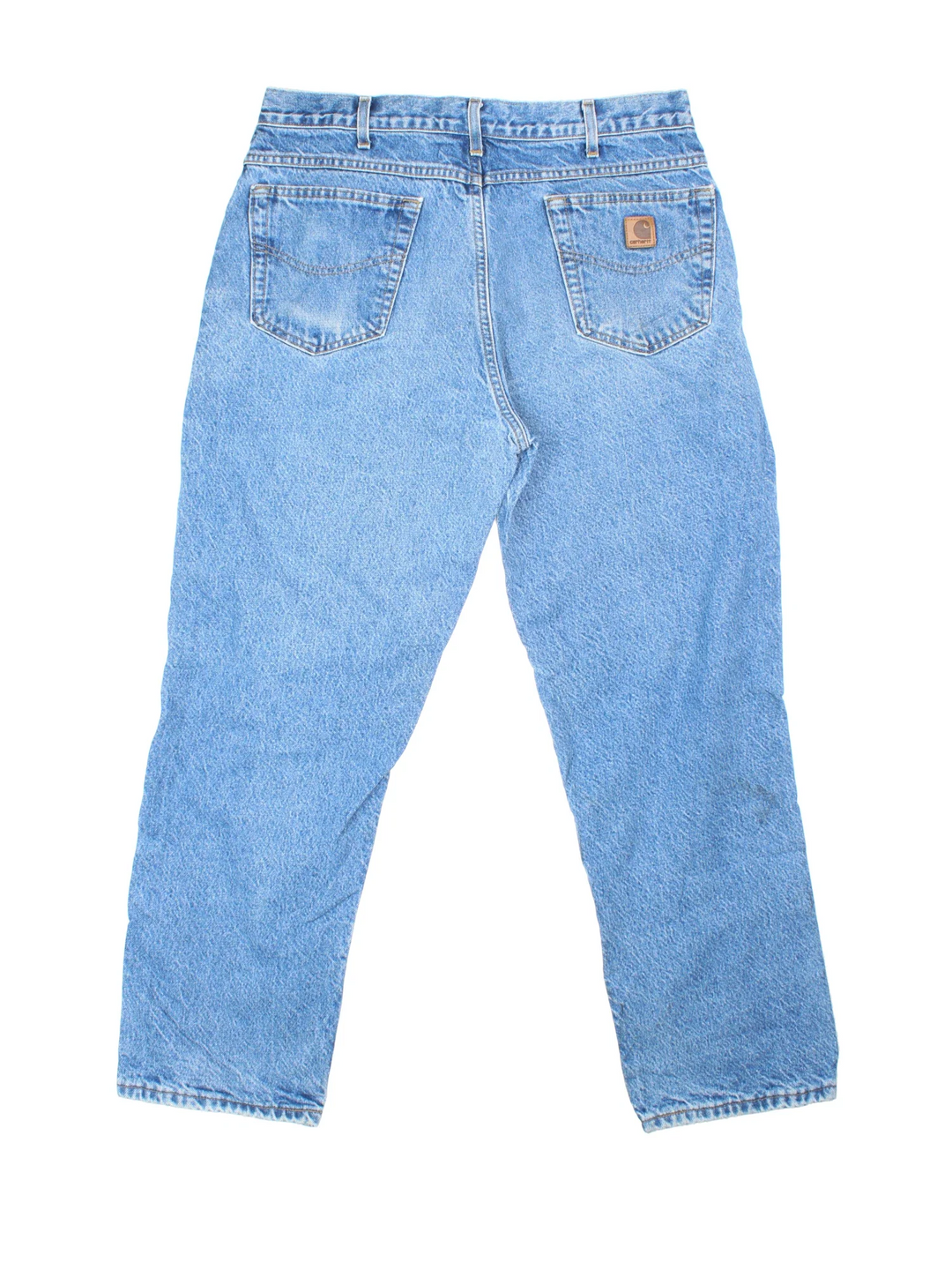 Carhartt Jeans in blue colourway with multiple pockets, plaid pattern lining, and the logo embroidered on the back.