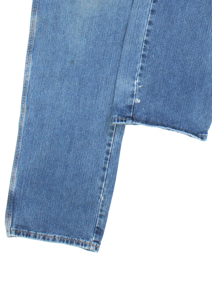 Dickies Carpenter Jeans in blue colourway with multiple pockets and the logo embroidered on the back.