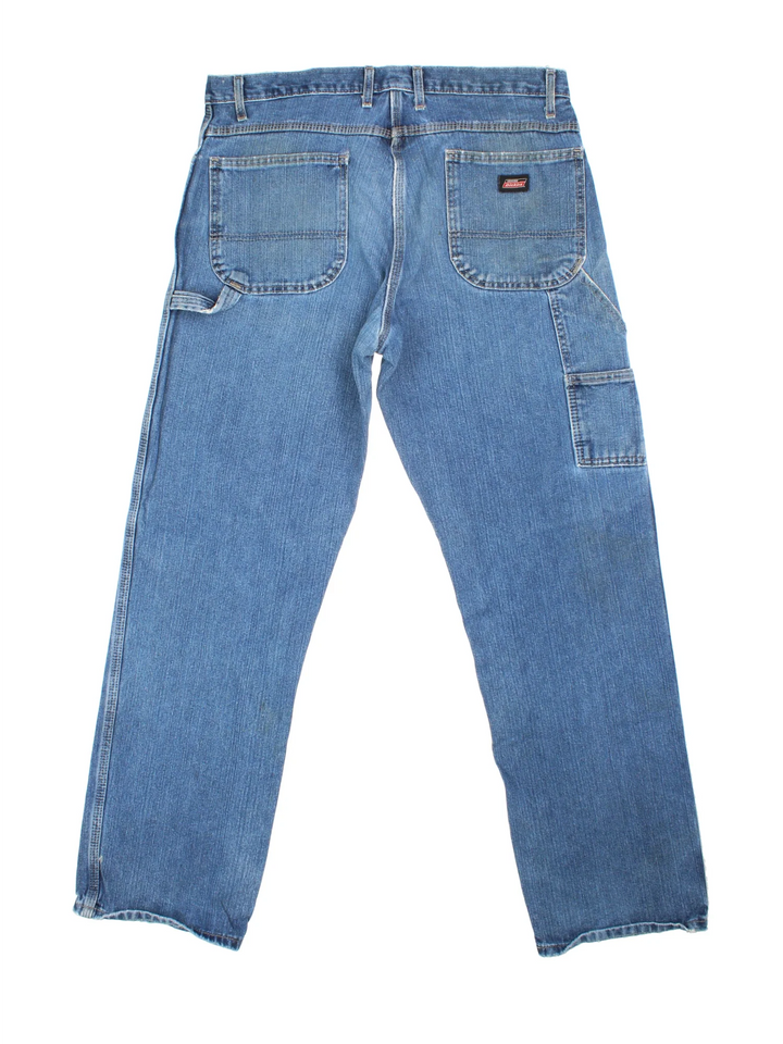 Dickies Carpenter Jeans in blue colourway with multiple pockets and the logo embroidered on the back.