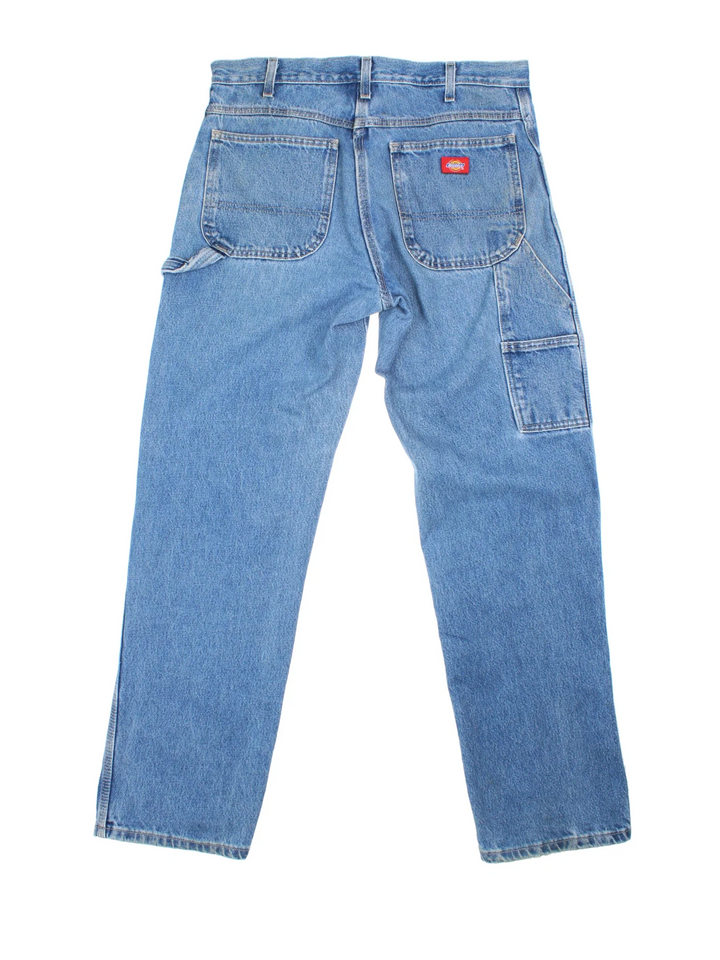 Dickies Carpenter Jeans in blue colourway with multiple pockets and the logo embroidered on the back.