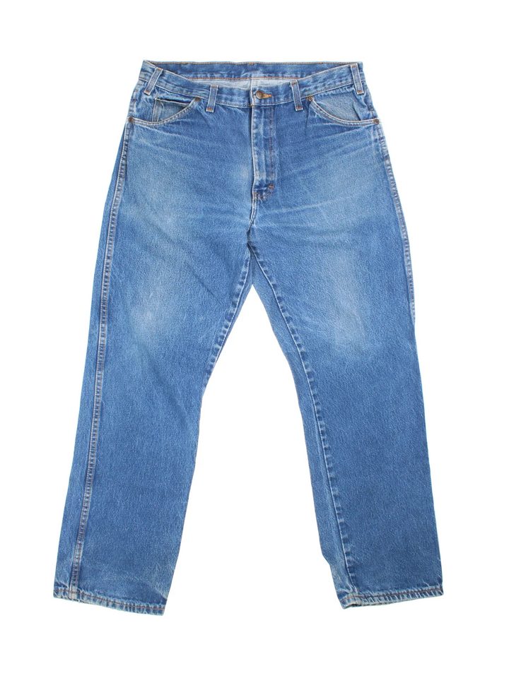 Dickies Jeans in blue colourway with multiple pockets and the logo embroidered on the back.