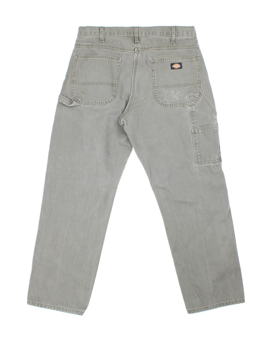Dickies Carpenter Jeans in a green colourway with multiple pockets and the logo embroidered on the back.