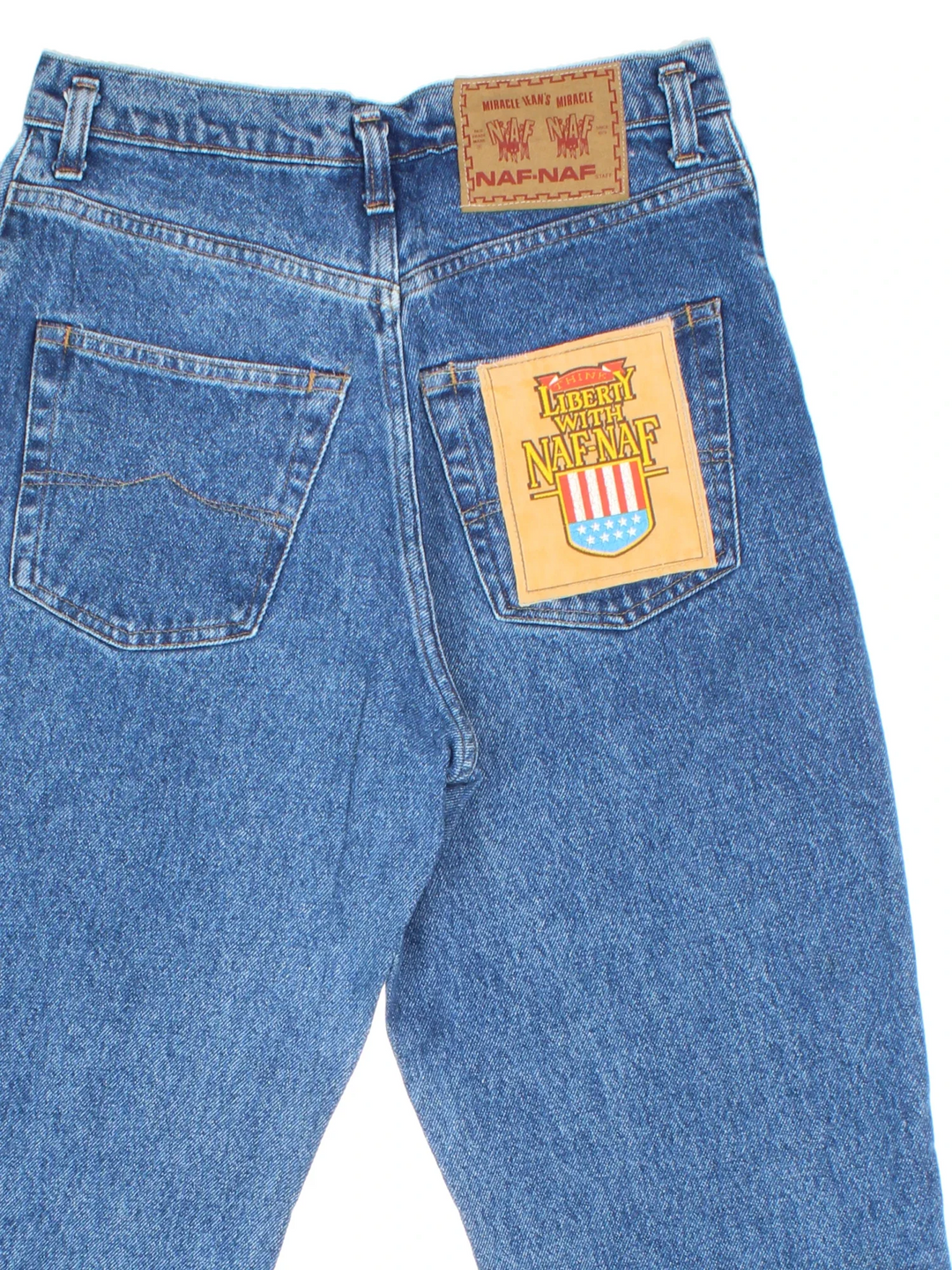 Vintage 90's High Waisted Naf Naf Jeans in blue colourway with multiple patches, contrast stitching and branding on the back.