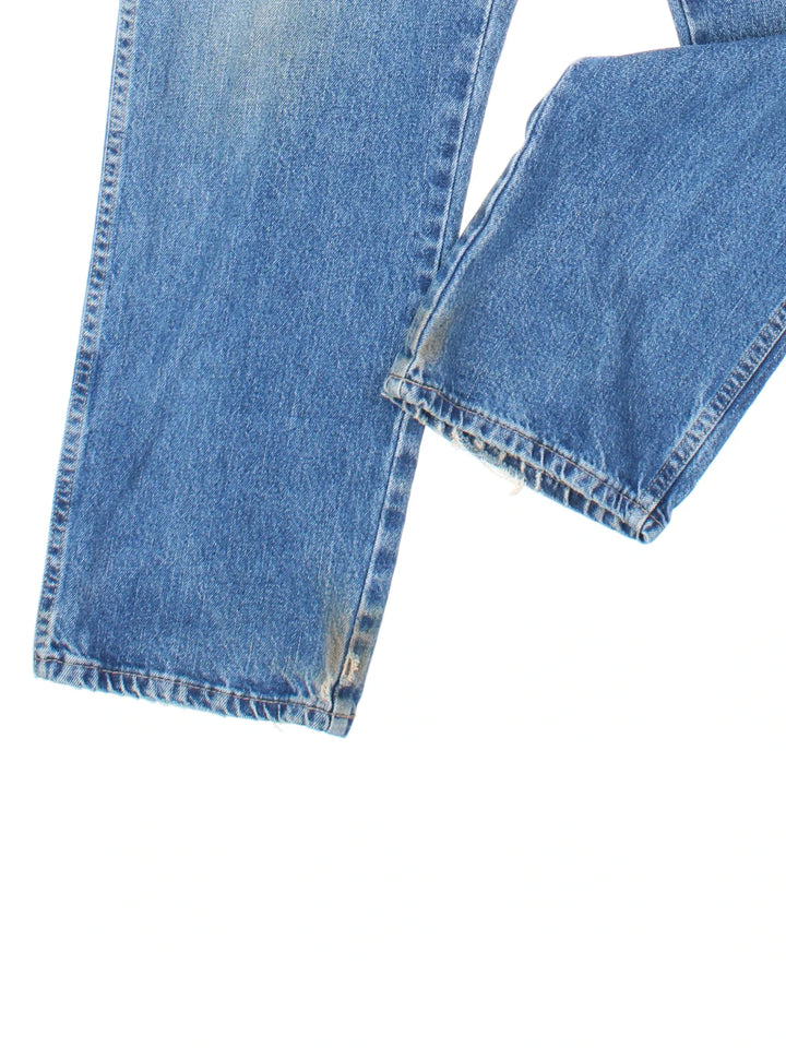 Dickies Jeans in blue colourway with multiple pockets, contrast stitching and branding on the back.