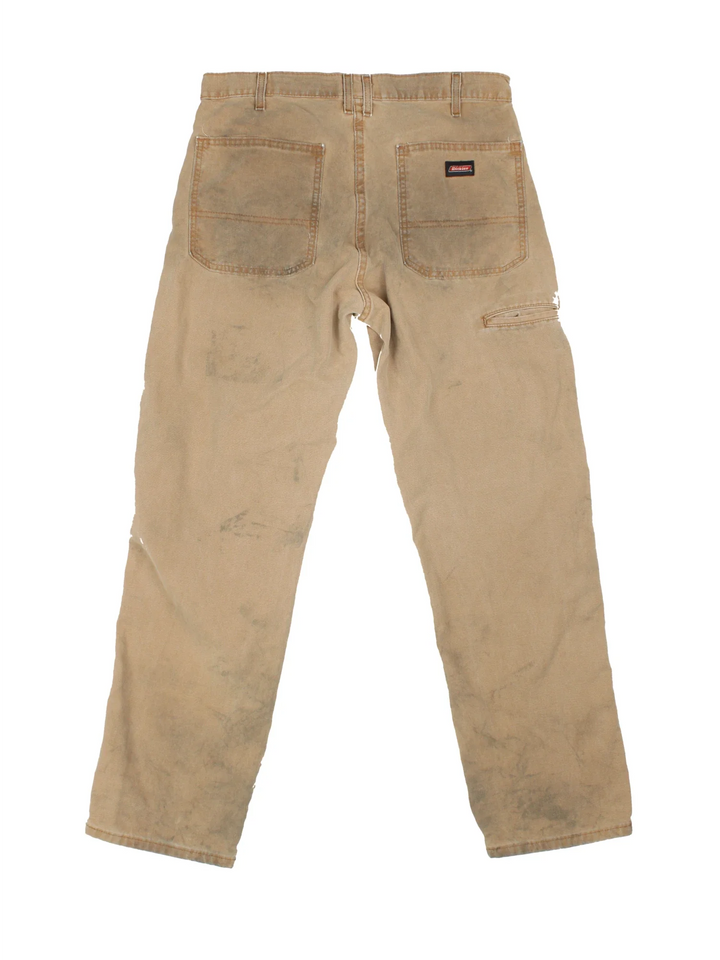 Dickies Carpenter Jeans in tan colourway with multiple pockets and branding on the back.