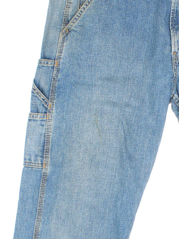 Levi Strauss Carpenter Jeans in blue colourway with multiple pockets and the logo embroidered on the back.