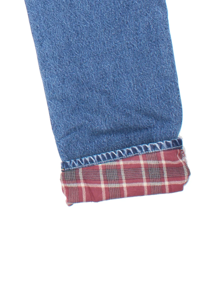 Dickies Lined Carpenter Jeans in blue colourway with multiple pockets, checked lining and the logo embroidered on the back.