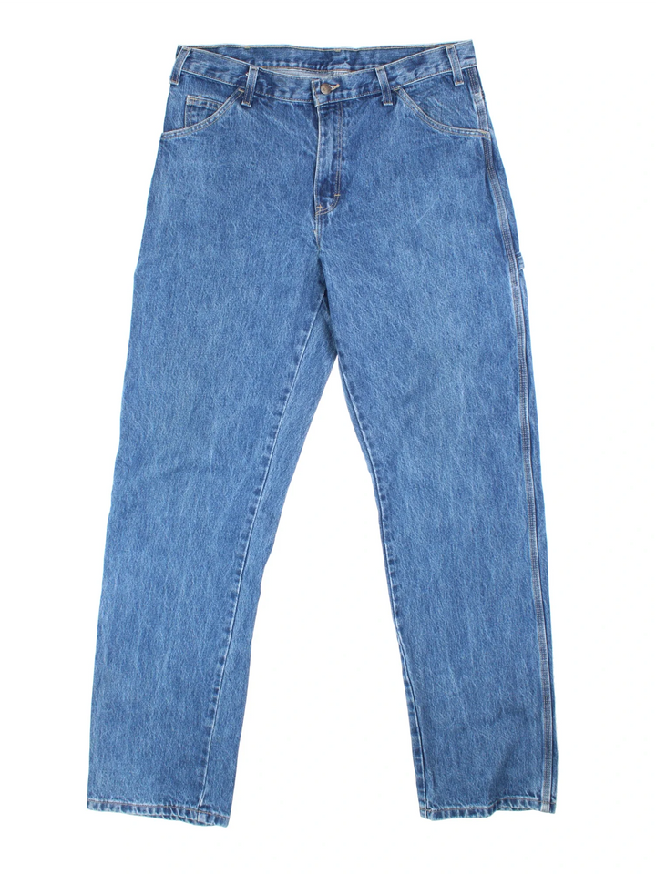 Dickies Carpenter Jeans in blue colourway with multiple pockets, and the logo embroidered on the back.