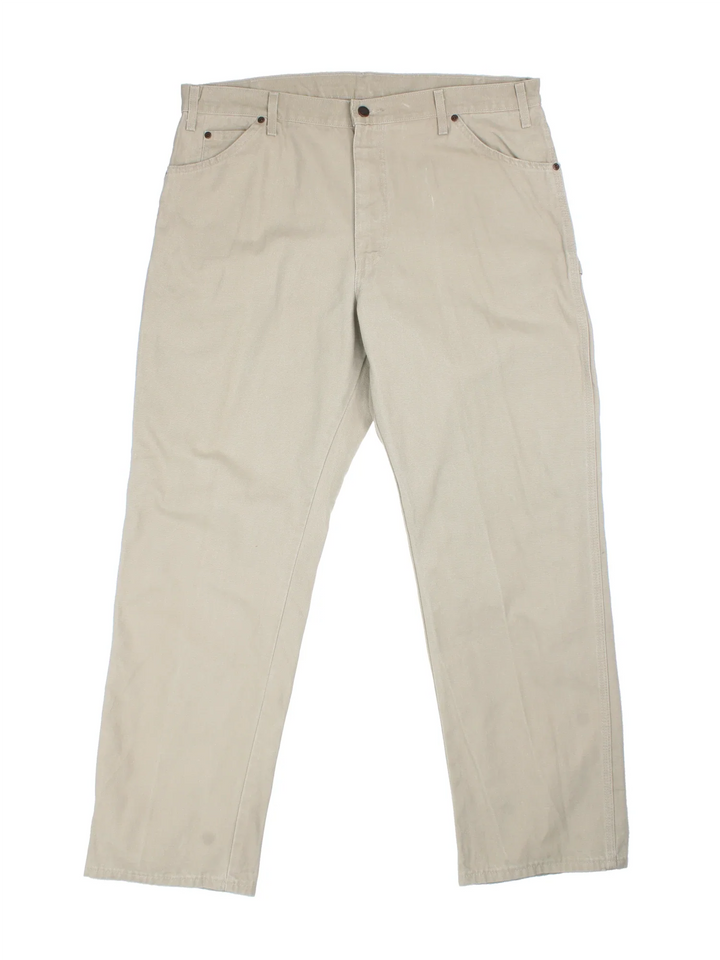 Dickies Carpenter Jeans in tan colourway with multiple pockets and the logo embroidered on the back.