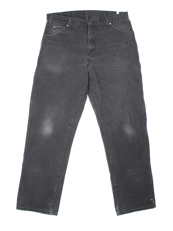Dickies Carpenter Jeans in black colourway with multiple pockets and the logo embroidered on the back.