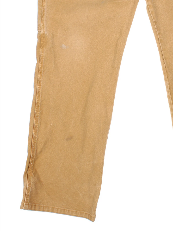 Dickies Carpenter Jeans in tan colourway with multiple pockets and the logo embroidered on the back.